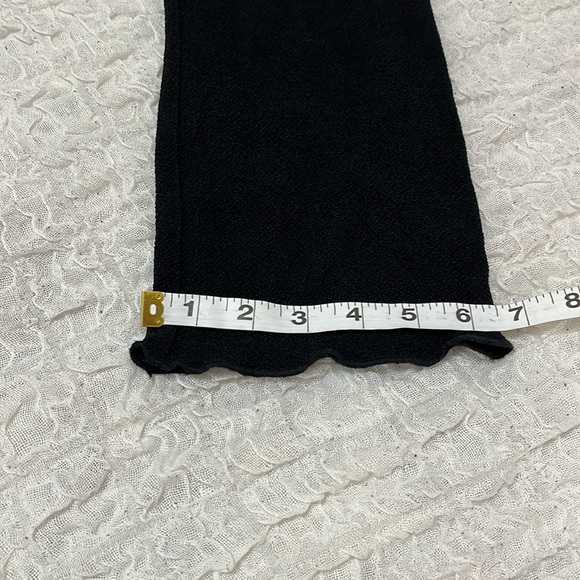 Travel Elegance Long Sleeve Black Top.
Size Large - Picture 12 of 15